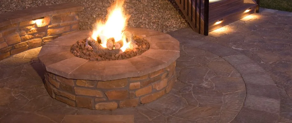 Burning fire pit on a property in Elm Grove, WI.