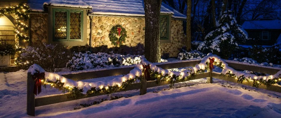 House in Elm Grove, WI, with holiday lights and decor.